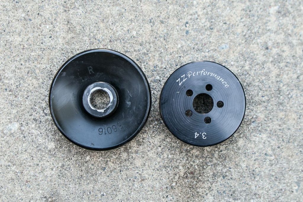 A smaller ZZP 3.4-inch pulley joined the party for more boost and more power. Note how much smaller it is than the stock unit.